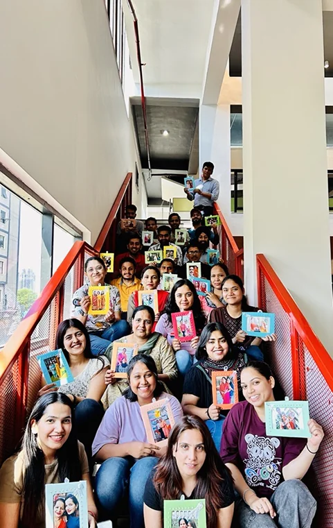 Defacto team members celebrating together